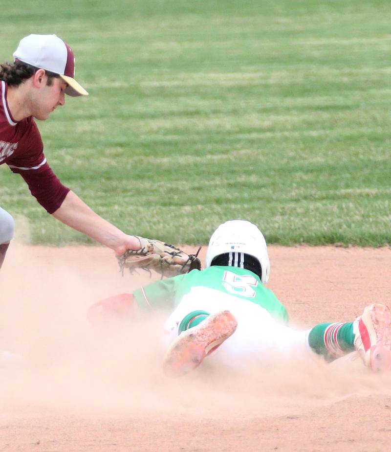 Morris's Nazim Baftiri tags out L-P's Seth Adams attempting to steal second base on Wednesday, April 17, 2024 at Huby Sarver Field inside the L-P Athletic Complex in La Salle.