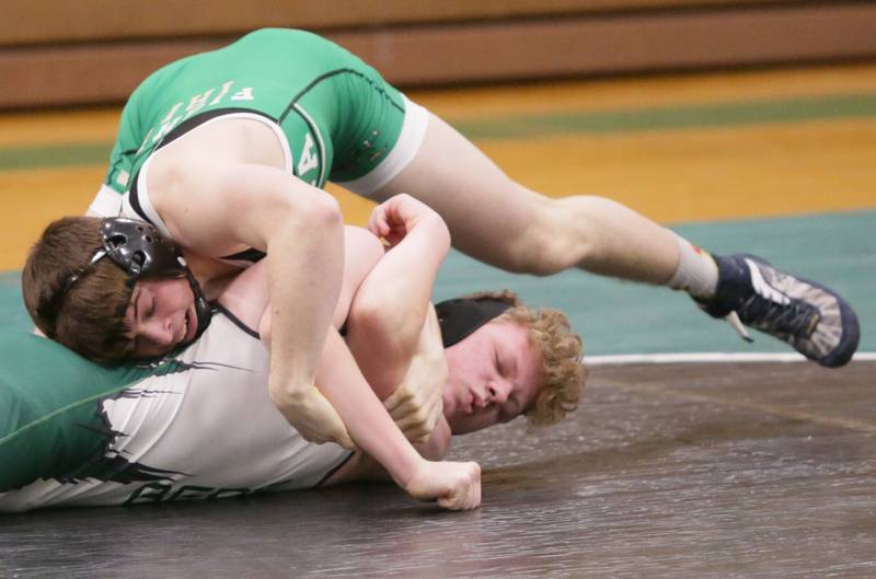 Seneca's Owen Feiner wrestles St. Bede's Jack Machmann in the 145-pound weight class during a triangular wrestling meet on Wednesday, Jan. 12, 2022 in Seneca.