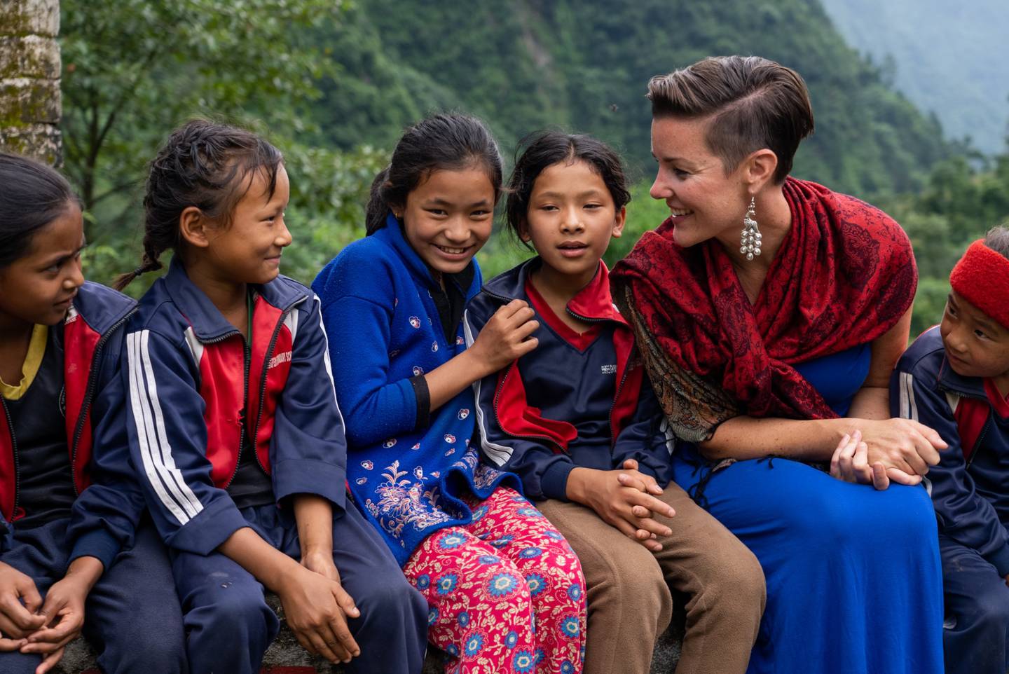 Katie Hilborn with children in Nepal who are housed at the INPowerment girls' learning center which was completed in 2022.