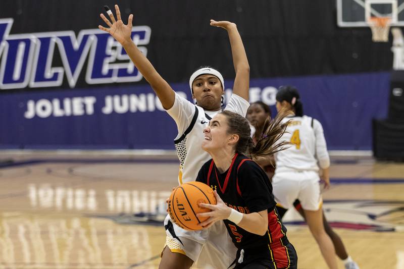 Tinley Park's Sarah Aggen drives to the basket during a WJOL Girls Basketball Tournament game against Joliet West at Joliet Junior College on Nov. 18, 2025.