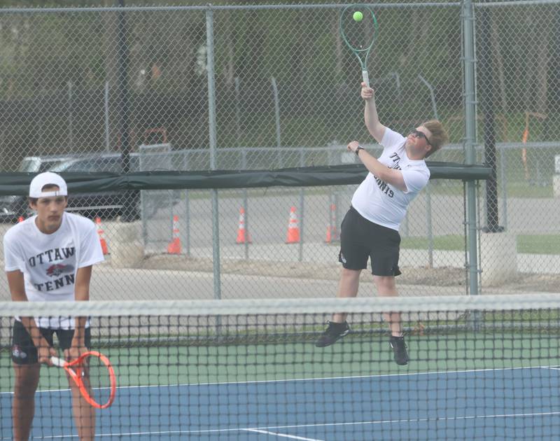 Ottawa's Leo England and Charlie Thiry play tennis on Tuesday, April 21, 2026 in the Henderson-Guenther Tennis Facility at Ottawa High School.
