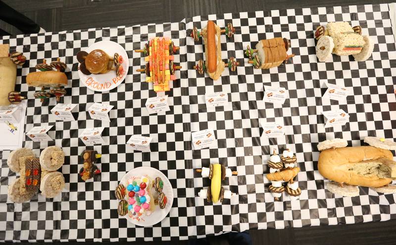 Cars made entirely from food are on display before racing during the 18th annual Editable Car Contest on Wednesday, Feb. 28, 2024 at Illinois Valley Community College in Oglesby.