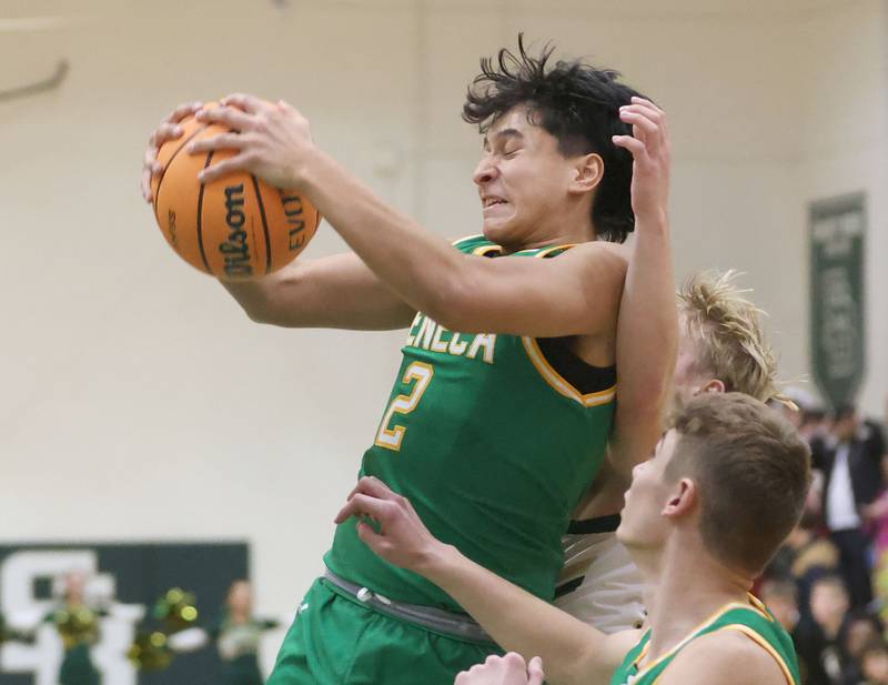 Seneca's Jesus Govea grabs a rebound against St. Bede on Tuesday, Dec. 16, 2025 at St. Bede Academy.