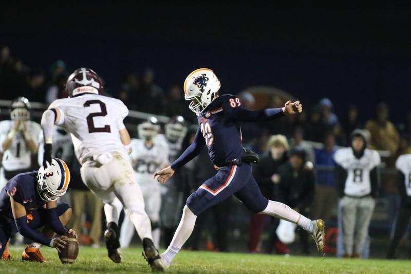 Oswego's Kaleb Stumpenhorst (89) kicks what turned out to be the winning field goal during Class 8A semifinal football game between Lockport at Oswego. Saturday, Nov 22, 2025 in Oswego.