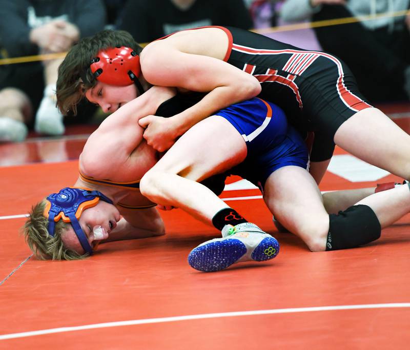Amboy's Landon Blanton (top) holds Genoa-Kingston's Shayden McNew during their 113-pound match at the 1A Oregon Wrestling Sectional on Friday night.