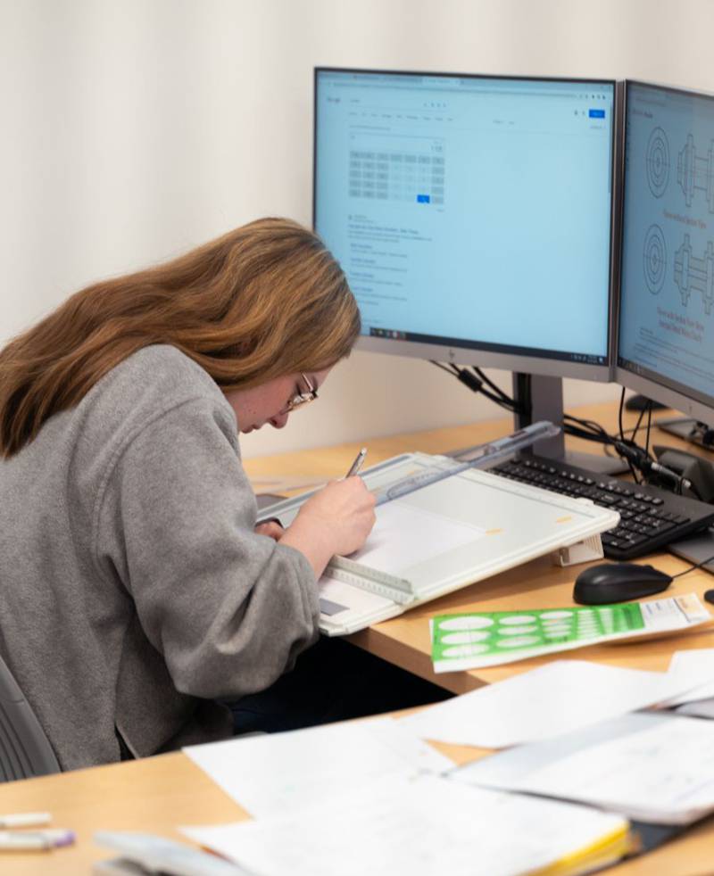 A Waubonsee CAD Program student works on manual technical drafting at the Plano Campus.