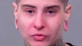 Woman arrested in connection with punching vehicles at Joliet sports bar