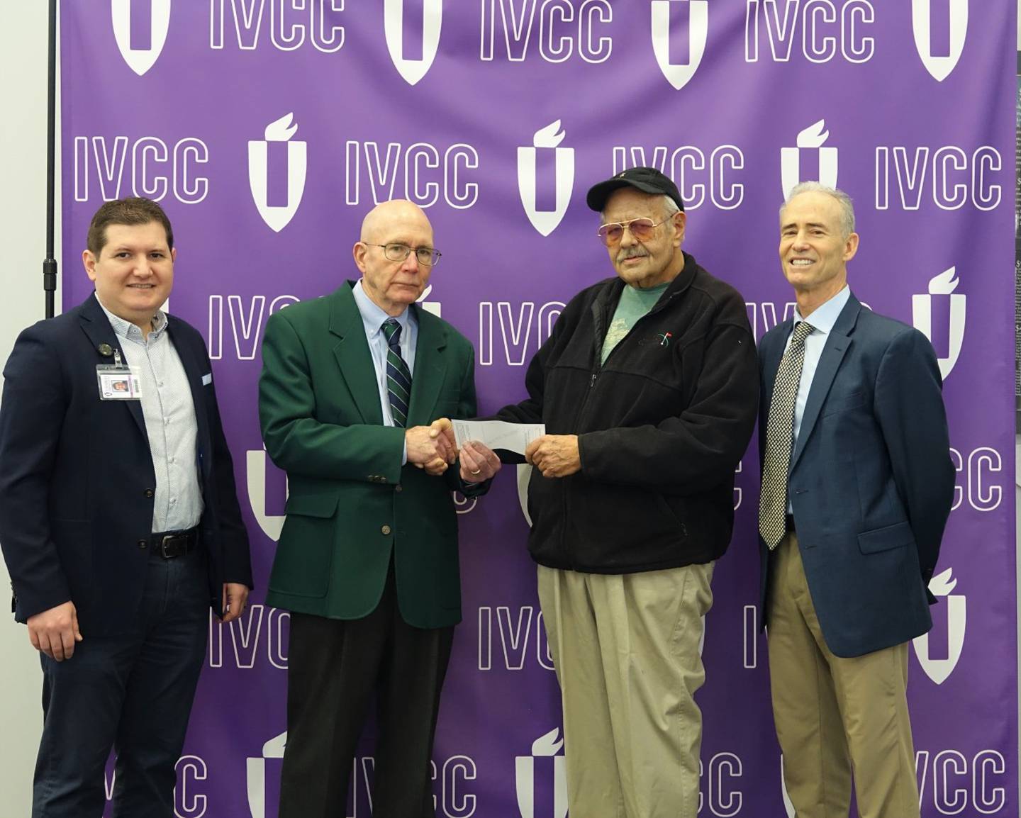 IVCC Dean of Humanities, Fine Arts and Social Sciences Lirim Neziroski, left, President Jerry Corcoran, Glen Gerrard and Executive Director of Community Relations and Development Fran Brolley.