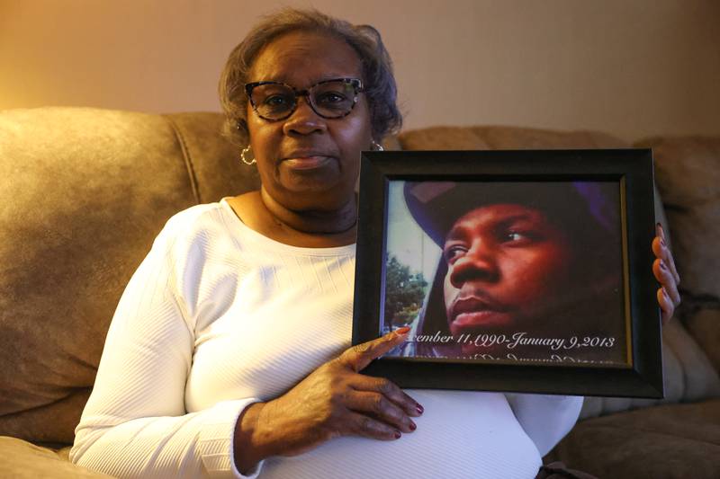 Jamille Kent holds a photo of her son Terrance Rankins. January 9th marked the 30th anniversary of the grisly Joliet murders of Terrance Rankins and Eric Glover Jr.