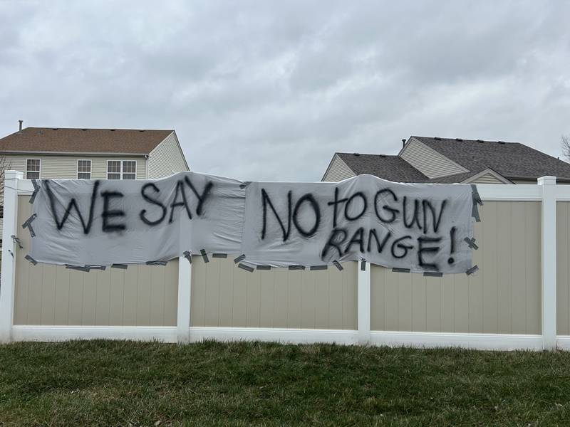 Residents bordering the proposed fire and police training facility property in Crest Hill have hung a sign protesting the construction of an outdoor gun range. 
Monday, March 31, 2025