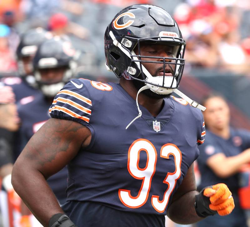Chicago Bears defensive tackle Justin Jones gets loose before the Bears take on the Kansas City Chiefs Sunday, Aug. 13, 2022, at Soldier Field in Chicago. The Bears beat the Kansas City Chiefs 19-14.