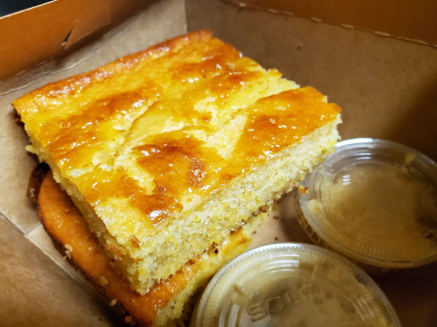 Station One Smokehouse in Plainfield serves its cornbread with a honey butter spread.