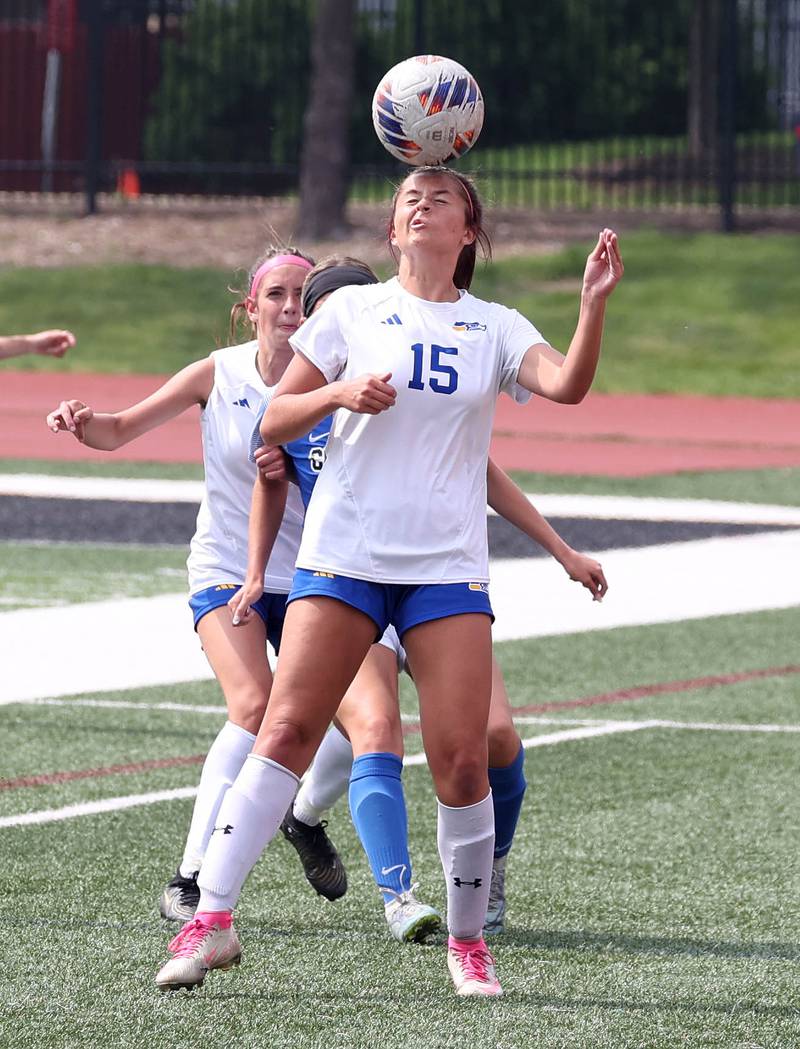 Johnsburg's Lauren McQuiston heads the ball away from Columbia's Jade Becker Saturday, June 7, 2025, during the IHSA Class 1A state championship game at North Central College in Naperville.