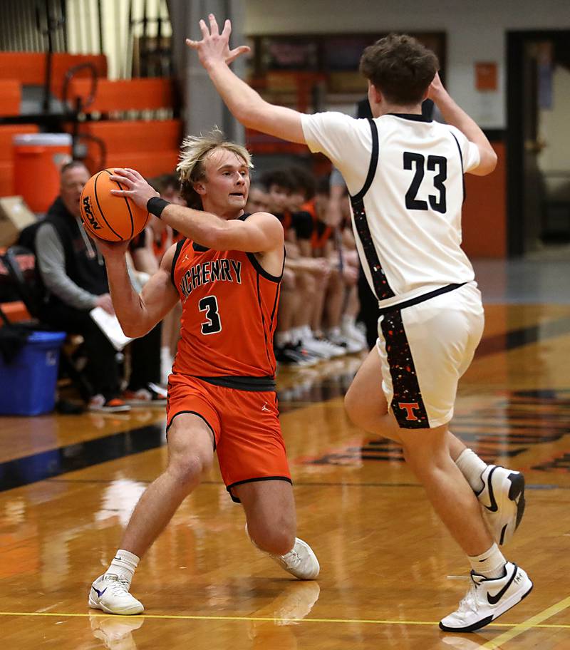 McHenry's Dane Currie brings the ball up the court against Crystal Lake Central's Logan Laudadio during a Fox Valley Conference boys basketball game on Tuesday, February. 10, 2026, at Crystal Lake Central High School.