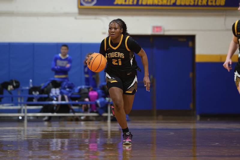 Joliet West’s Jada Thompson works the ball up court against Joliet Central on Thursday, Jan. 15, 2026 in Joliet.