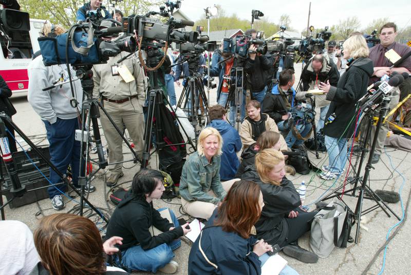 Media from all over the country gather for an interview on Wednesday, April 21, 2004 downtown Utica.