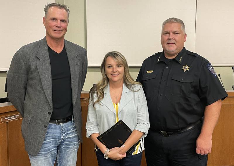 Sergeant Page Bond was honored by Village Officials during a Village Board meeting at Oswego Village Hall on Sept. 6 2022.
(left to right: Village President Troy Parlier, Bond, Police Chief Jeff Burgner)