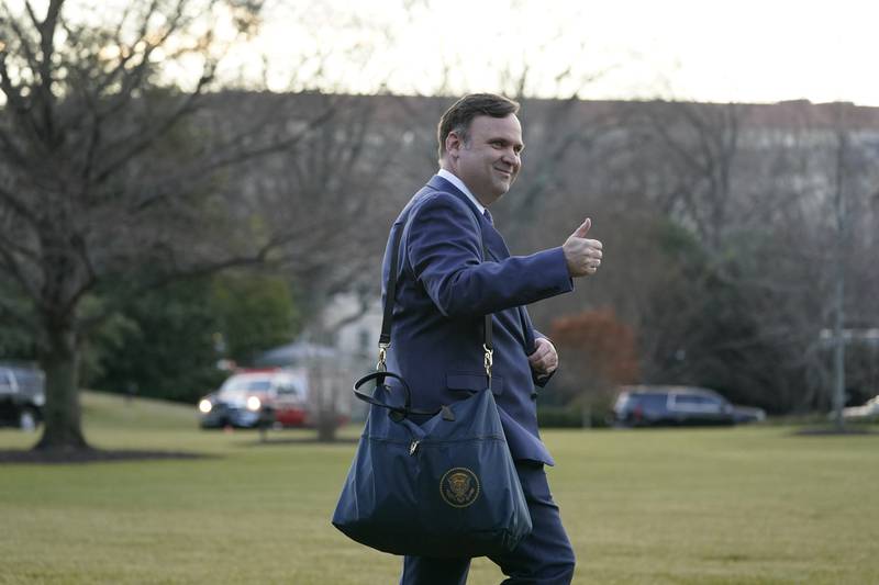 FILE - White House social media director Dan Scavino walks to board Marine One on the South Lawn of the White House, Wednesday, Jan. 20, 2021, in Washington. The House committee investigating the Jan. 6 attack on the U.S. Capitol is pushing ahead with contempt charges against former Trump advisers Peter Navarro and Dan Scavino in response to their monthslong refusal to comply with subpoenas. (AP Photo/Alex Brandon, File)