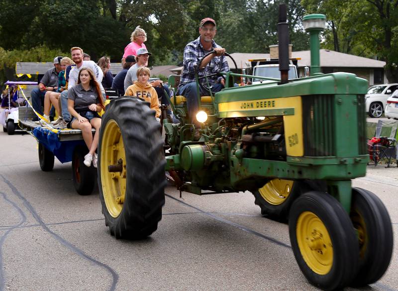 The Kaneland High School FFA (Future Farmers of America) participates in the 2024 Kaneland Homecoming Parade in Sugar Grove on Wednesday, Oct. 4, 2024.