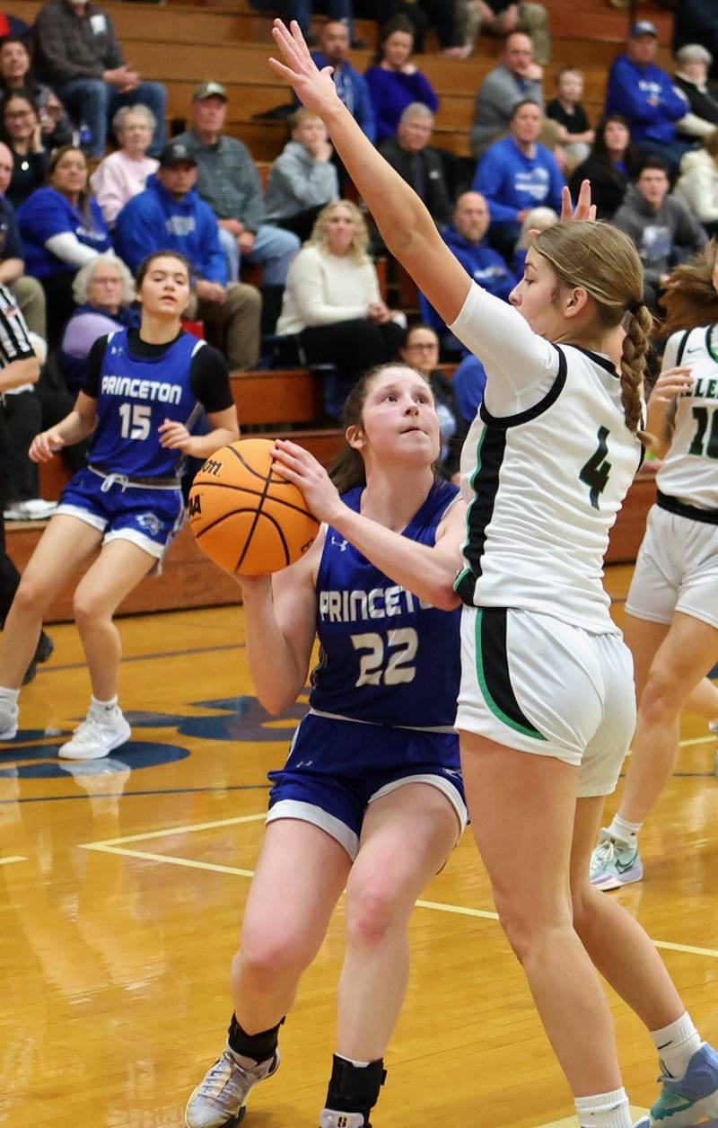 Princeton's Camryn Driscoll spots up for a shot against Alleman's Lilli Lempke in Thursday's regional championship game at Prouty Gym. The Pioneers won 40-27.