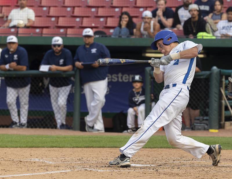 Newman’s Daniel Kelly drives the ball to left field against Chicago Hope Monday, June 2, 2025, during the Class 2A Supersectional at Northwestern Medicine Field in Geneva.