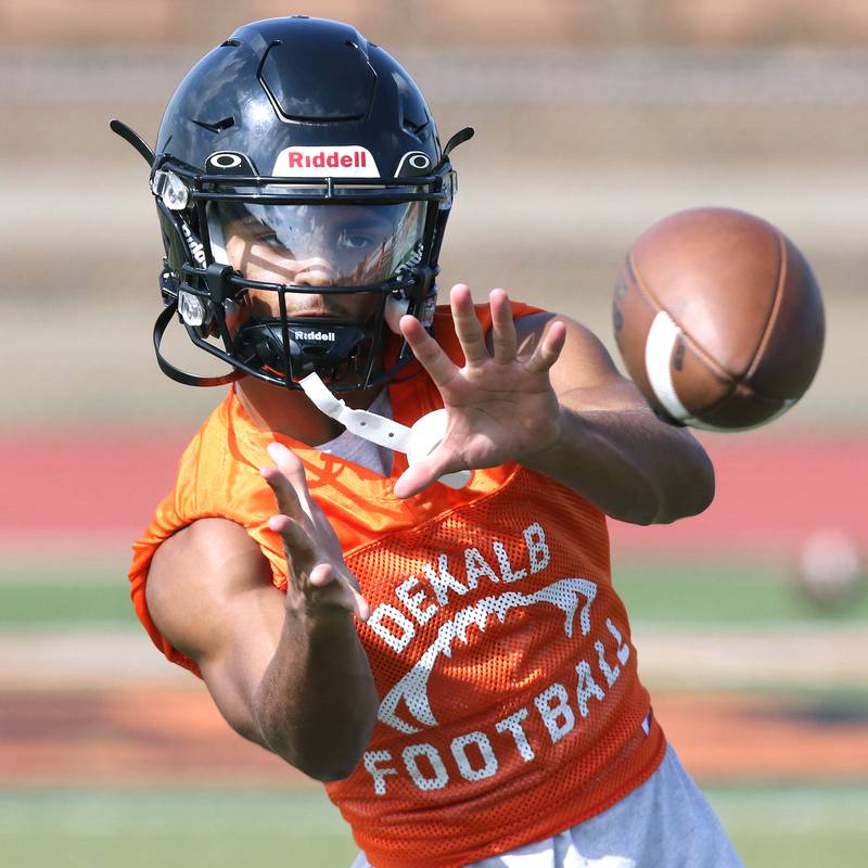 DeKalb’s Xavier Dandridge catches a pass during practice Monday, Aug. 7, 2023, at DeKalb High School.