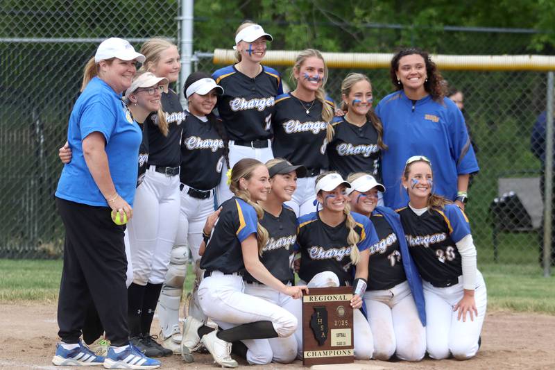 Aurora Central Catholic’s Chargers celebrate a 4-3 win over Marengo in varsity girls softball IHSA Class 2A Regional Title Game action on Friday, May 22, 2026 at Raymond Benoy Field on the campus of Marian Central High School in Woodstock.