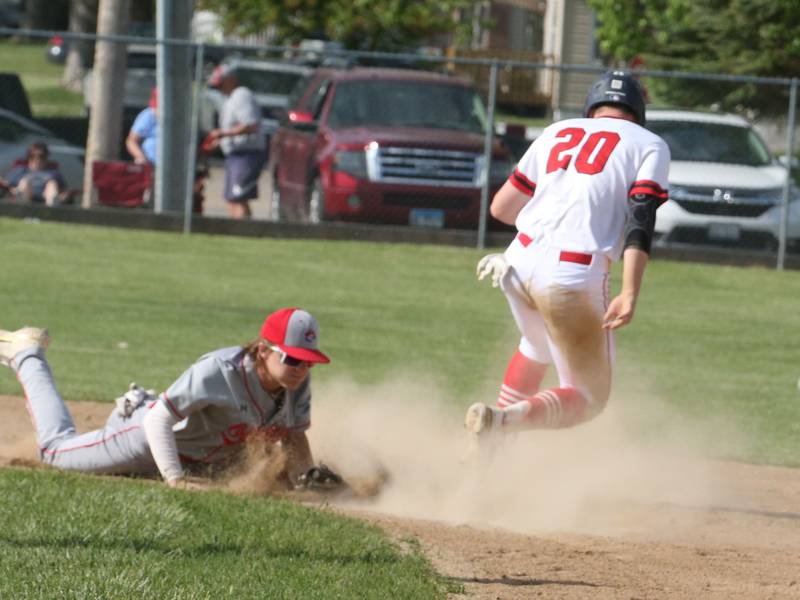 Streator's Brady Grabowski reaches second base as Ottawa's Hutson Hart misses the throw down to the bag on Tuesday, May 16, 2023 at Streator High School.