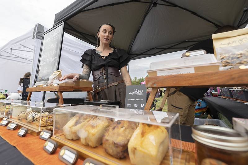 Jaclyn Sciacero, sour dough maker for “doughMama,” sells her baked goods at Dixon’s Fall Fantasy Fest Saturday, Sept. 20, 2025.