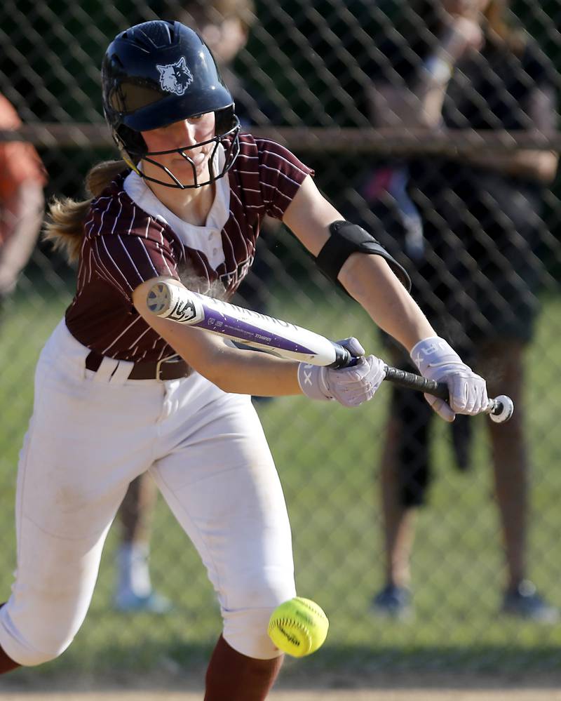 Prairie Ridge's Kendra Carroll lays down a bunt during a Fox Valley Conference softball game against Crystal Lake Central on Wednesday, May 14, 2025, at Crystal Lake Central High School.