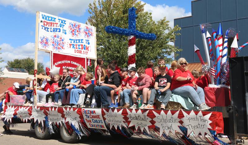 The Princeton Christian Academy float rolls down South Main Street during the 54th annual Homestead Festival parade on Saturday, Sept. 6, 2025 in Princeton.