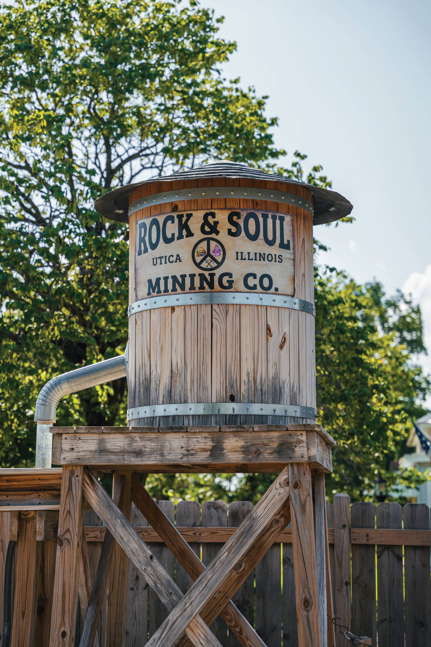A miniature water tower is part of the sluice box where children can mine for rocks and gemstones at The Rock and Soul in Utica.