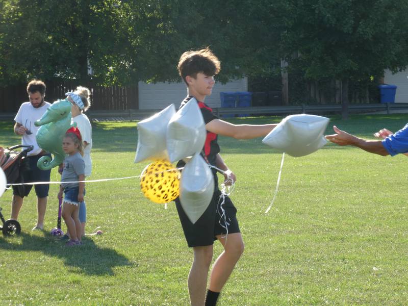 A prayer vigil and balloon release was held at Oriole Park in Chicago on Monday night, August 1, 2022 to mourn the loss of seven killed, including Lauren Dobosz and her four children, in a tragic car crash that occurred Sunday on I-90 near Hampshire.