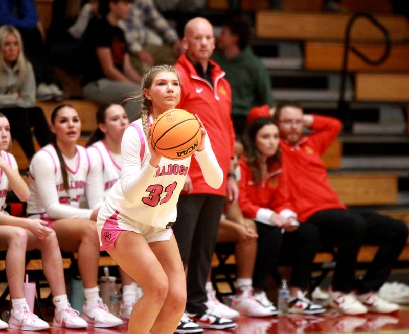 Batavia’s Natalie Warner shoots three points during a game against St. Charles North on Monday, Dec. 16, 2024 in Batavia.