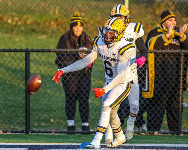 St Laurence's Aaron Ball (6) celebrates a touchdown run during Class 4A third round playoff football game between St Laurence at IC Catholic Prep.  Nov 11, 2023.