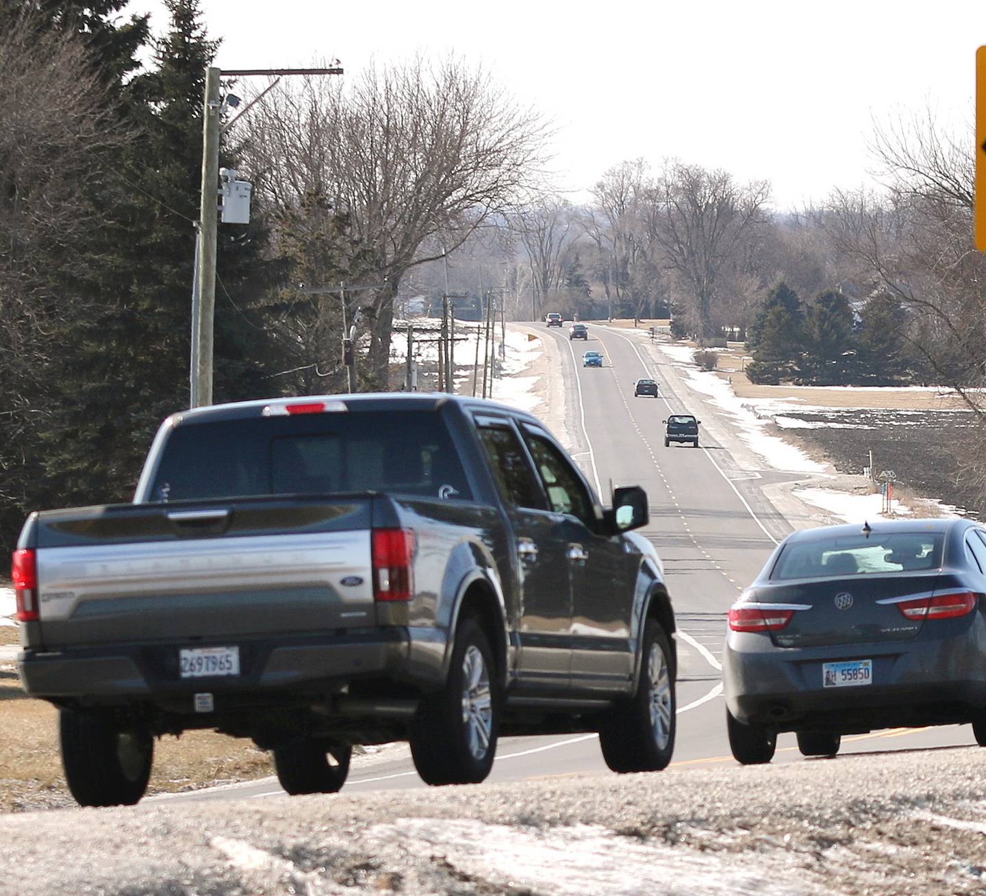Shaw Local 2020 file photo – Vehicles drive down Plank Road between Lindgren and Moose Range Roads in Sycamore.