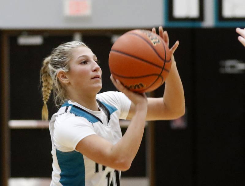 Woodstock North’s Addison Rishling shoots a three-pointer during a Kishwaukee River Conference girls basketball game against Woodstock on Friday, Jan. 5. 2024, at Woodstock North High School.