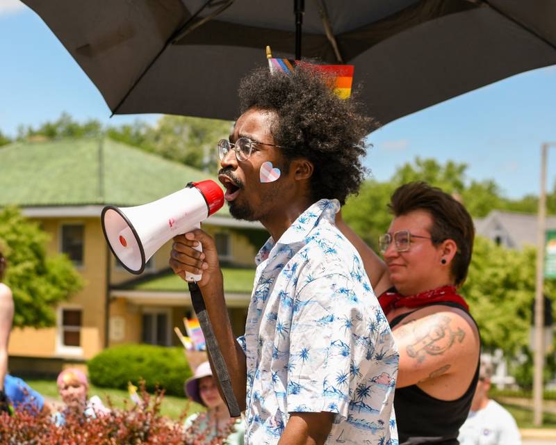 Eli Curry of DeKalb speaks during a Trans Resilience Rally held on Sunday, June 22, 2025, in downtown DeKalb. Organizers said the rally was to show public support for people they believe are unjustly and harmfully targeted under President Donald Trump's policies.