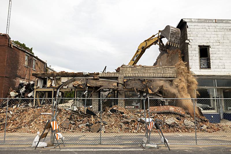 Demolition of the three story building began early Tuesday, Sept. 5, 2023.