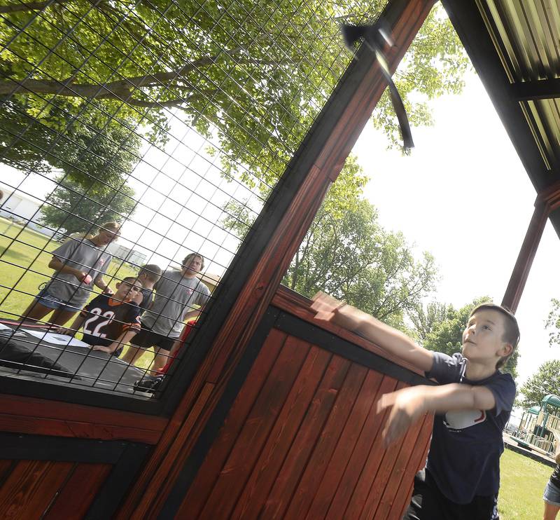 Children from Marseilles, Ottawa and Grand Ridge enjoyed the day Wednesday, July 5, 2023, at Grand Ridge Park for A Day On The Farm. An Ottawa Recreation program had a variety of events for children to participate including ax throwing demonstrated here by Everett Groesch.