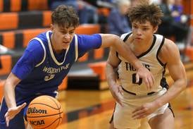 Local legend’s pregame speech fires up Woodstock: Northwest Herald boys basketball notebook