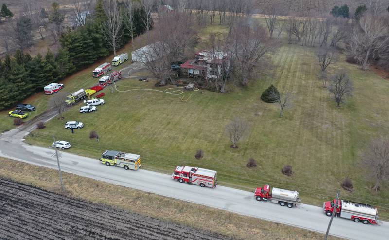 Firefighters respond to a structure fire on North 43rd road about a half mile west of the East 1st road intersection on Thursday, Jan. 2, 2024 in Mendota.