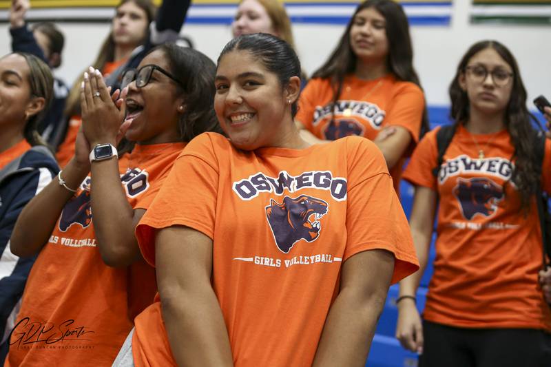 The Oswego student section cheers on the team during Class 4A Regional Final volleyball match between Neuqua Valley at Oswego. Oct 30, 2025 in Plainfield.