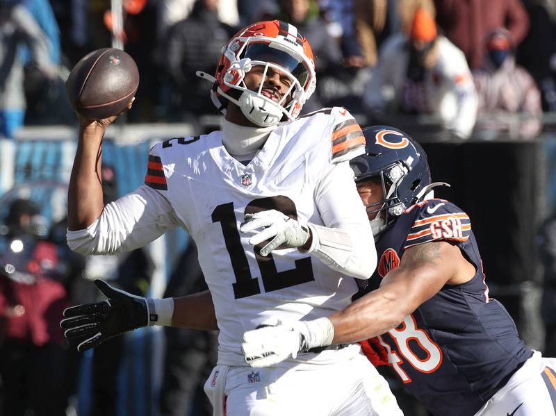 Chicago Bears linebacker D'Marco Jackson sacks Cleveland Browns quarterback Shedeur Sanders during their game Sunday, Dec. 14, 2025, at Soldier Field in Chicago.