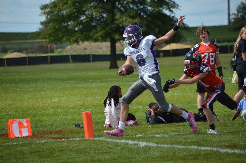 Rochelle quarterback Maddex Jackson (with ball) scores a touchdown during an eighth-grade junior tackle game with Stillman Valley on Sunday, Sept. 7, 2025. Rochelle won the game 28-0.