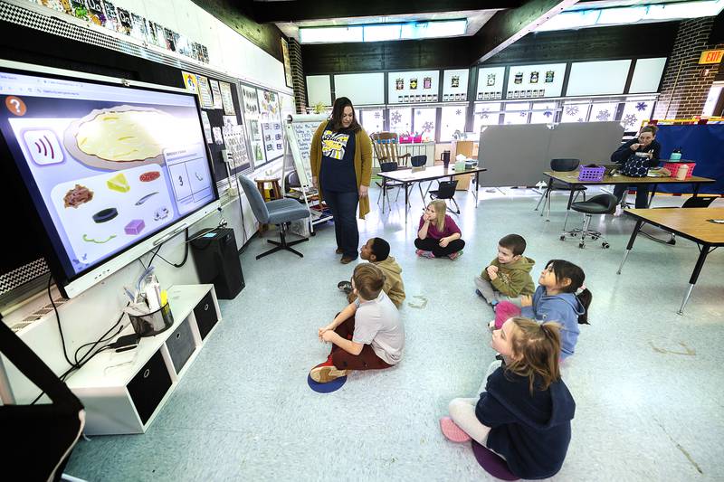 Jefferson School life skills teacher Kara Jones leads her class Friday, Feb. 7, 2025, in a counting game on the smart board. The interactive boards are a newer addition to the school.