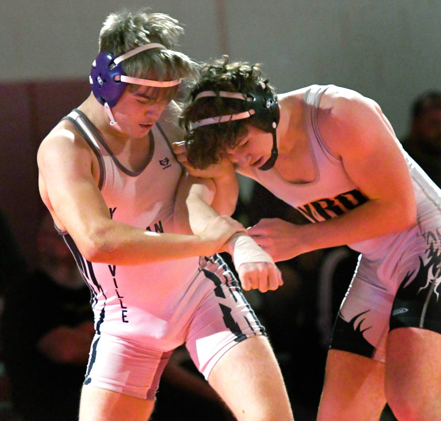 Yorkville Christian's Christopher Durbin (left) wrestles Byron's Kyle Jones for third place at 182 pounds at the 1A Oregon Wrestling Sectional on Saturday. Durbin won the match, but both wresetlers advance to the state finals.