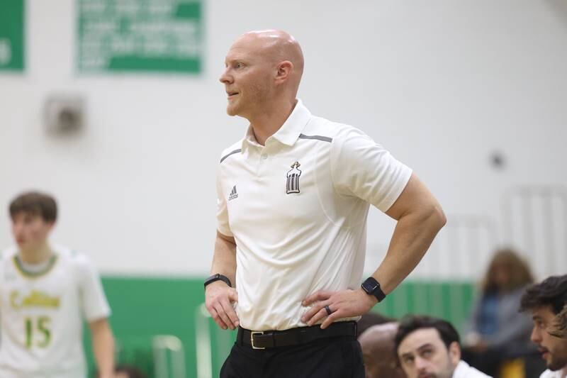Joliet Catholic head coach Adam DeGroot watches the game against Providence on Saturday, Dec. 9th, 2023 in New Lenox.