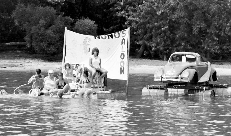 The Anything That Floats races were held from 1978-1986 each year in Peru. Contestants received a free case of Old Style beer upon entering. The rules were simple. To enter, participants needed to build a raft less than 50 feet in length and each person had to have a life jacket on board whether you wore it or not. A rope had to be attached to the raft for towing. Rafts were made from styrofoam, inter tubes or barrels. A minimum of two paddles were required on the float. Rafts were launched at the Starved Rock Boat Ramp and finished at the Peru boat launch area. Overtime, the event grew and got to big and out of control that organizers had to scrap it. This photo was found in the La Salle NewsTribune archives.