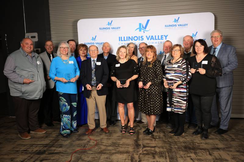 Recipients of the Cornerstone Award pose for a group photo during the Illinois Valley Chamber of Commerce Champions of Change Awards Night on Thursday, April 10, 2025 at the Westclox Event Center in Peru.